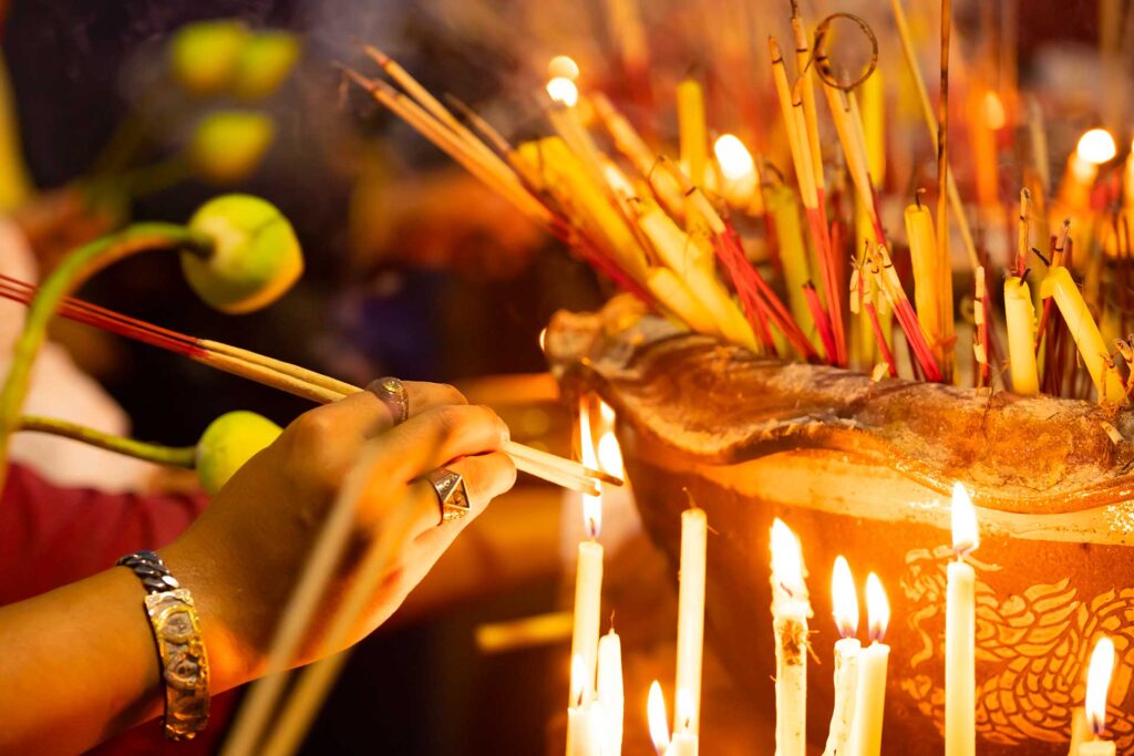burning incense sticks in a buddhist temple in tha 2023 11 27 05 08 34 utc.jpg